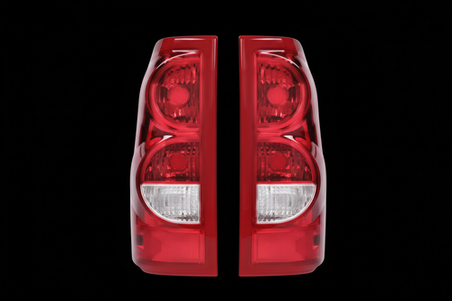 Red tail lights pair on black background